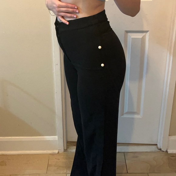Asymmetrical pearl black flare pants - Picture 1 of 5